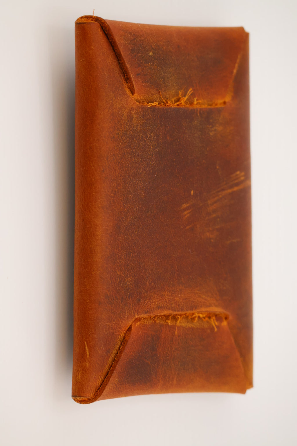 Rustic leather card carrier