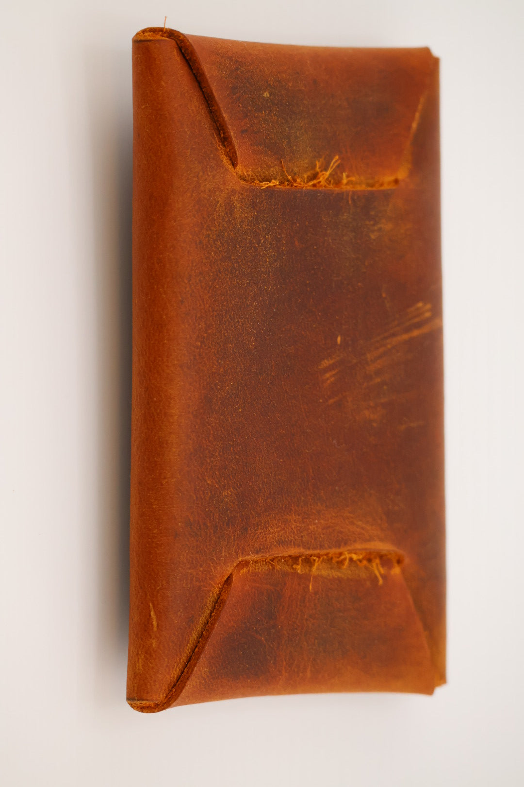 Rustic leather card carrier