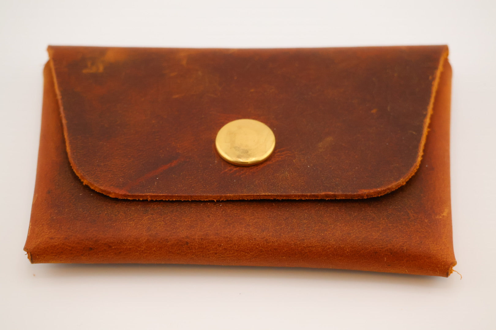 Rustic leather card carrier