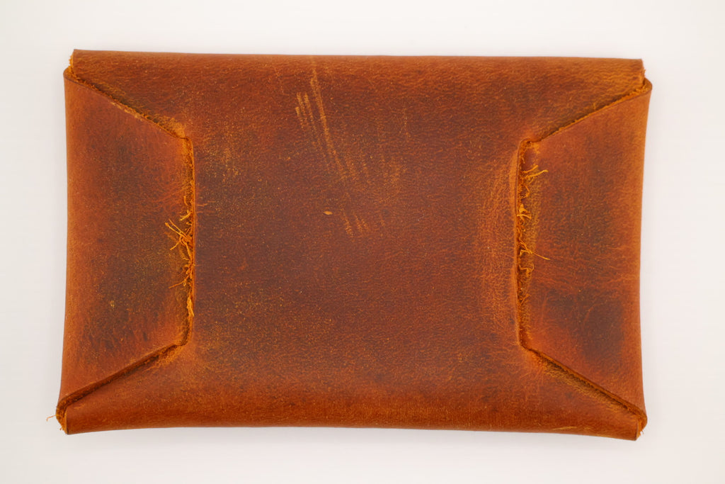 Rustic leather card carrier